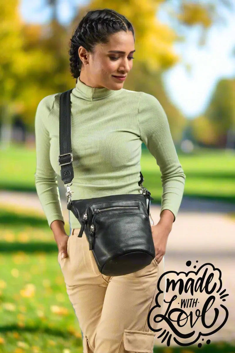 Style Nepal i sort i ny mellemstørrelse. Enestående og sublim skulder- og crossbodytaske i smukt design med rund bund Octopus Denmark