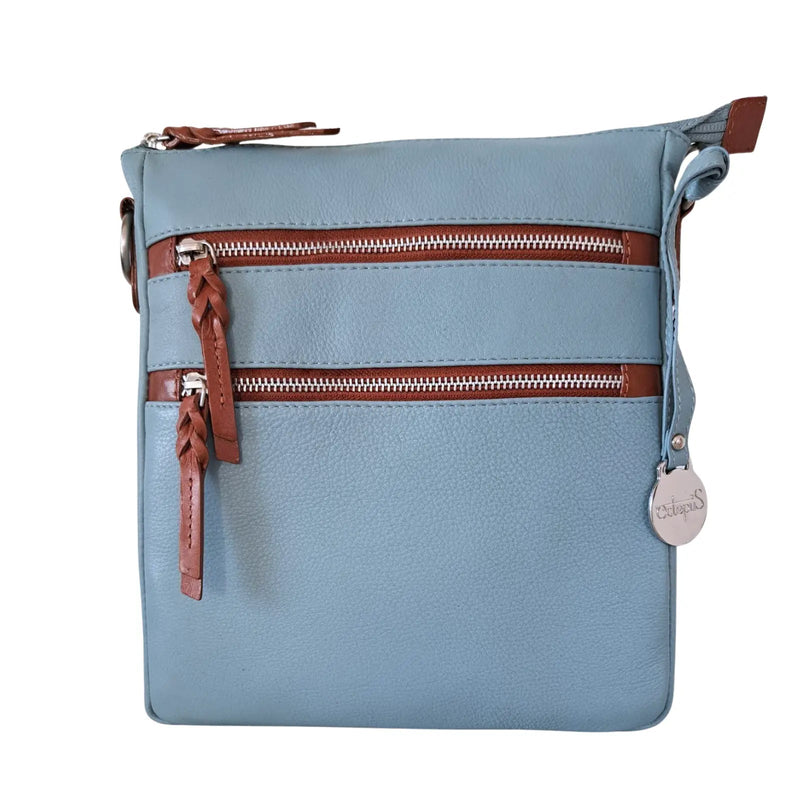 Style Playa i smukt lyseblåt læder med brune detalje. Skøn skulder- og crossbodytaske med flotte kontraster Octopus Denmark